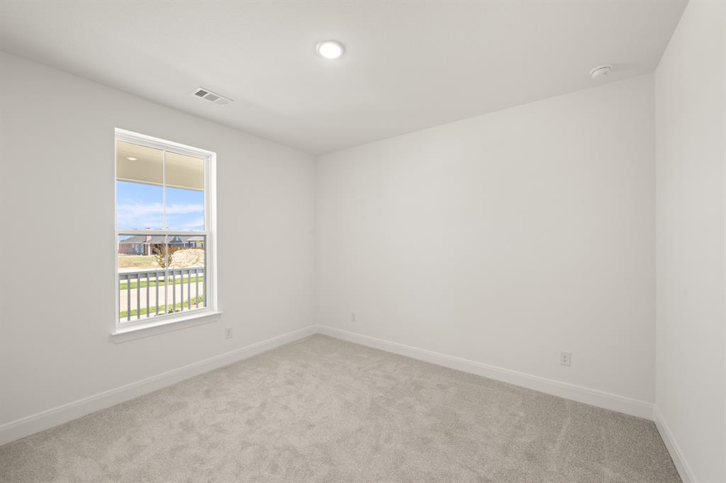 408 Dylan Way Midlothian, TX 76065 - Photo 21 of 40 an empty room with a window