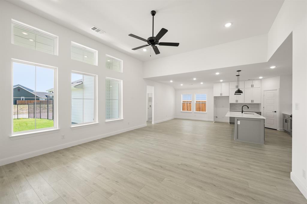 408 Dylan Way Midlothian, TX 76065 - Photo 25 of 40 a view of a livingroom with furniture window and wooden floor