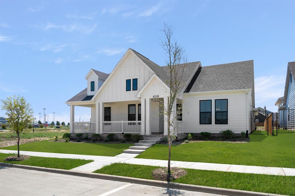 408 Dylan Way Midlothian, TX 76065 - Photo 3 of 40 a view of a house in front of a yard with plants