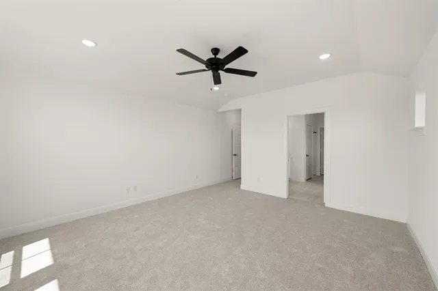 a bathroom with a double vanity sink mirror and toilet