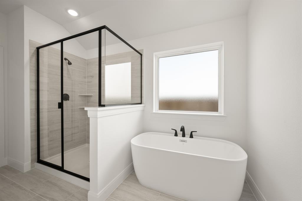 408 Dylan Way Midlothian, TX 76065 - Photo 37 of 40 a white bath tub sitting next to a white sink