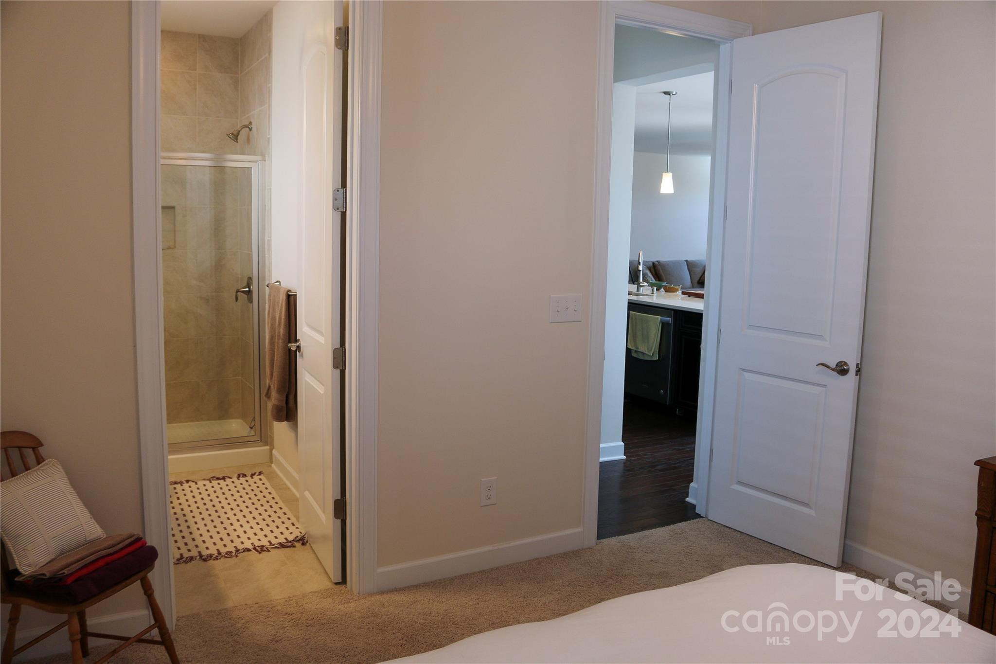 1296 Independence Street Tega Cay, SC 29708 - Photo 18 of 28 a view of a hallway with bathroom and bathroom