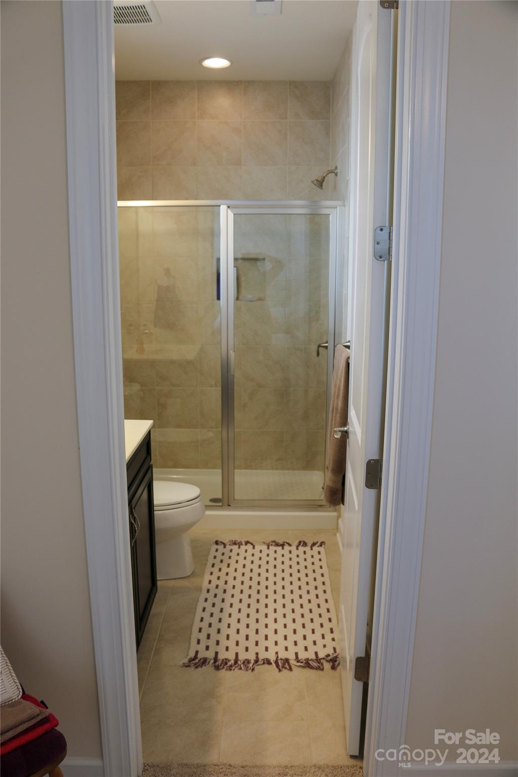1296 Independence Street Tega Cay, SC 29708 - Photo 25 of 28 a bathroom with a shower