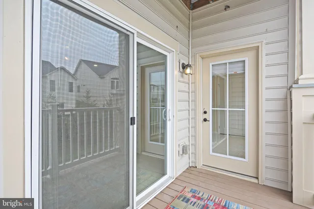 a view of a storage & utility room with closet dryer and washer