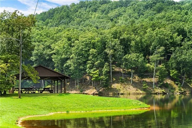 a view of a lake with a big yard
