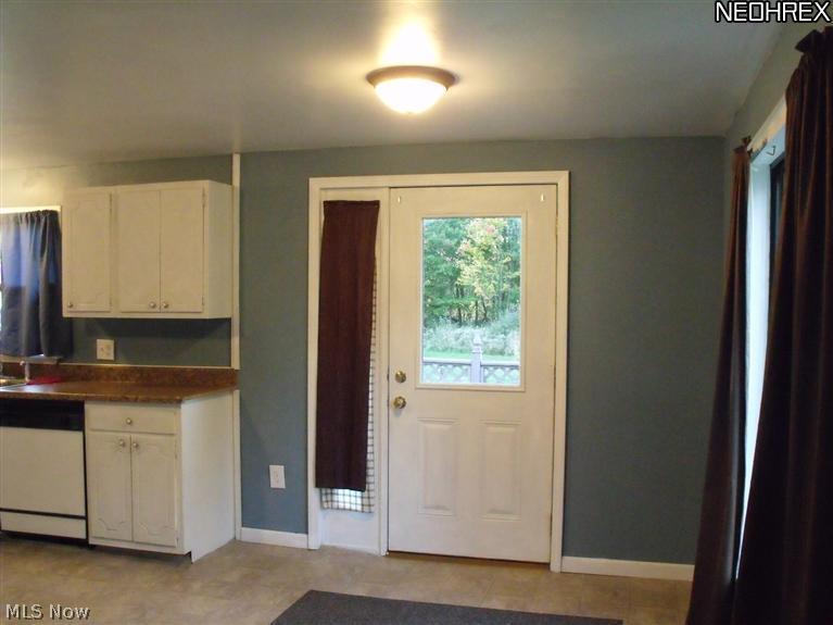 2223 Linton Road Jefferson, OH 44047 - Photo 5 of 15 dining area leads off to the deck
