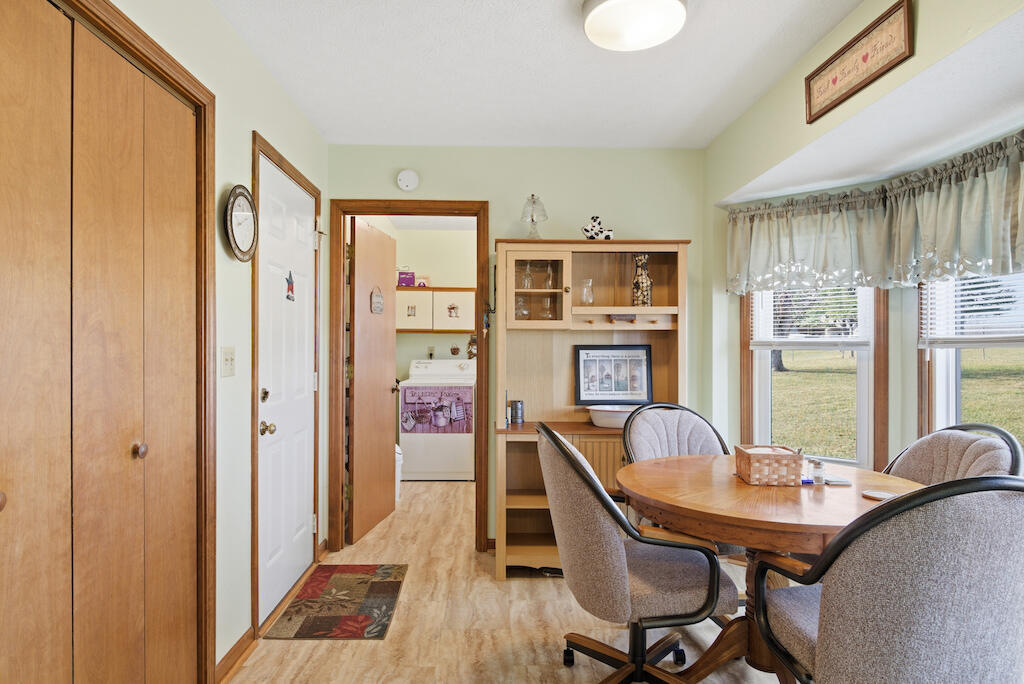 6389 Ruebush Road Dublin, VA 24084 - Photo 20 of 63 a view of a dining room with furniture window and wooden floor