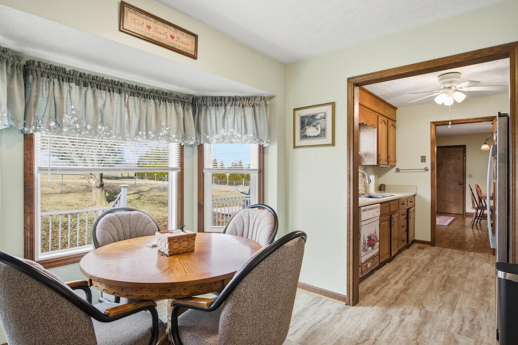 6389 Ruebush Road Dublin, VA 24084 - Photo 21 of 63 a dining room with furniture and window