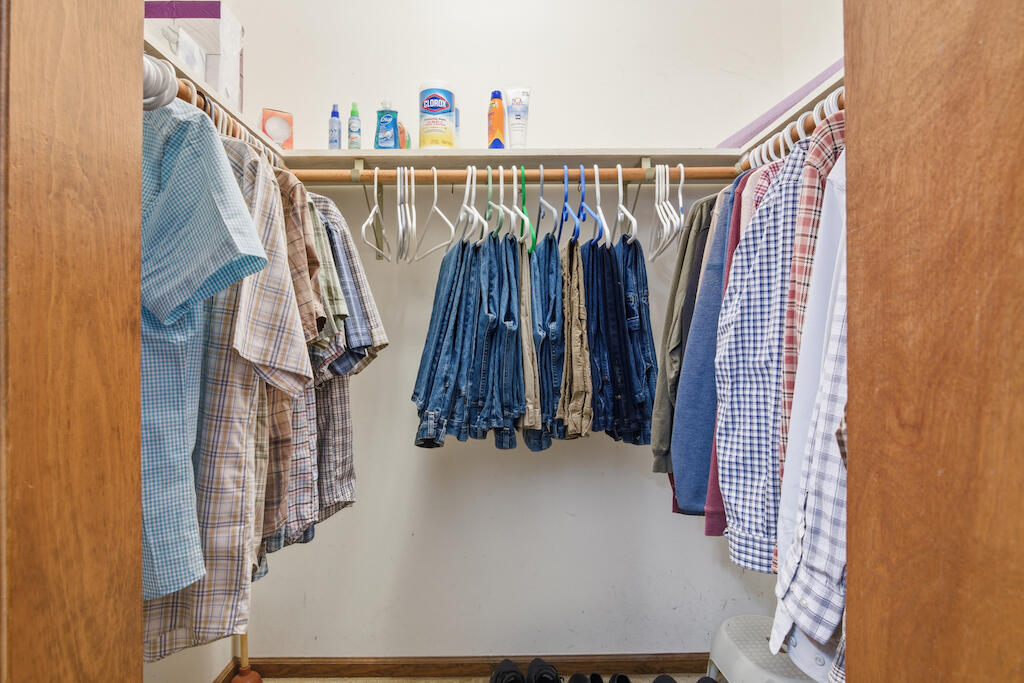 6389 Ruebush Road Dublin, VA 24084 - Photo 28 of 63 a view of walk in closet with clothes and shoes