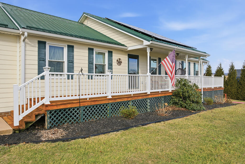 6389 Ruebush Road Dublin, VA 24084 - Photo 3 of 63 a front view of a house with a yard
