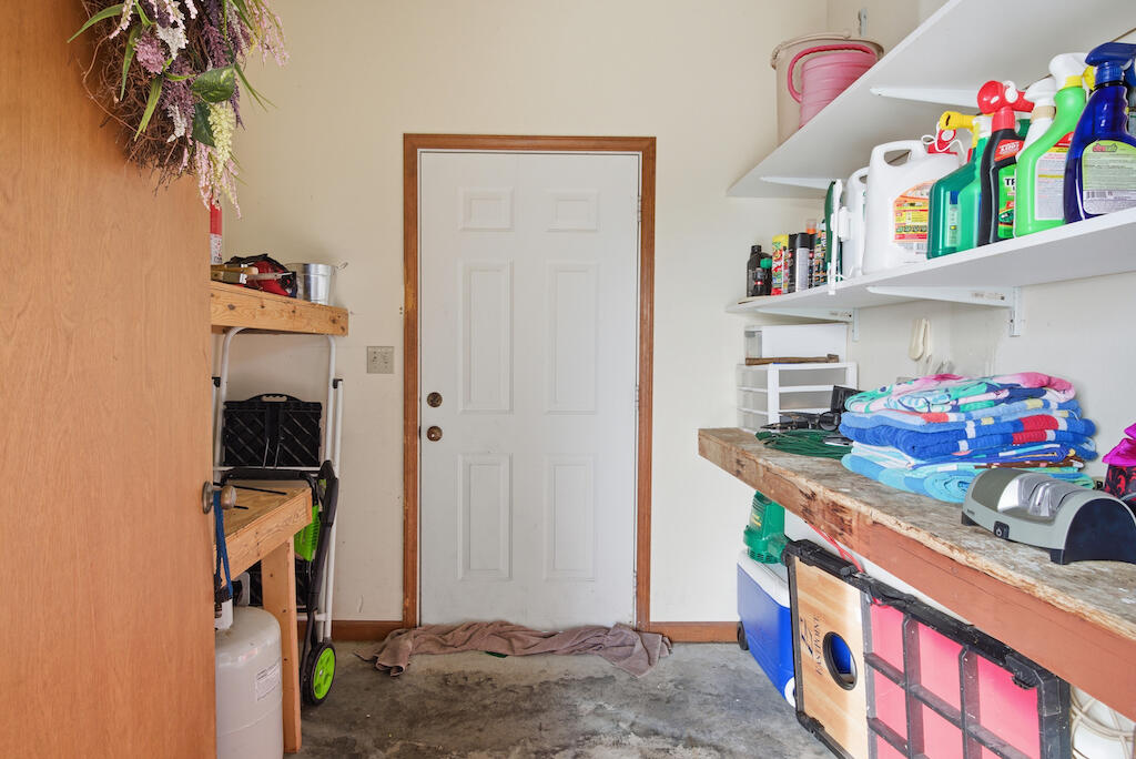 6389 Ruebush Road Dublin, VA 24084 - Photo 38 of 63 a kitchen with stainless steel appliances granite countertop a sink and a refrigerator