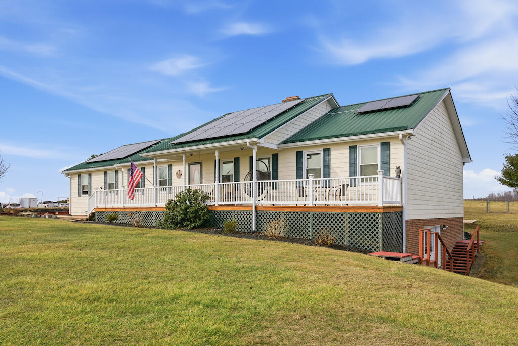 6389 Ruebush Road Dublin, VA 24084 - Photo 51 of 63 a front view of a house with a garden