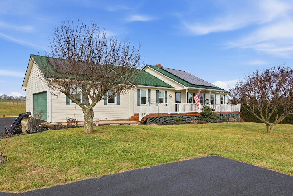 6389 Ruebush Road Dublin, VA 24084 - Photo 53 of 63 a front view of a house with a yard