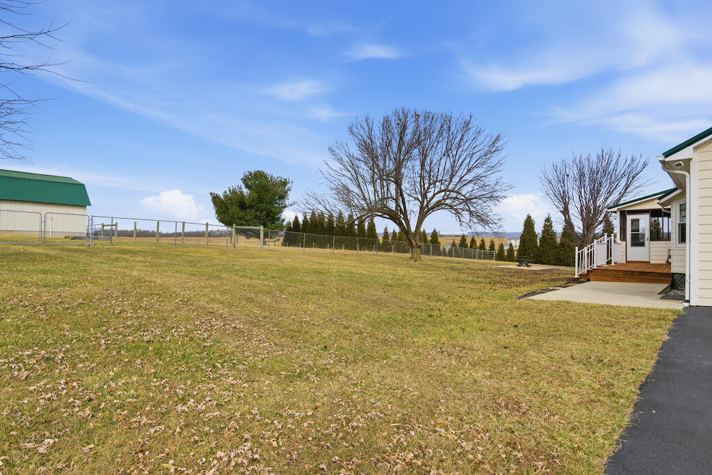 6389 Ruebush Road Dublin, VA 24084 - Photo 57 of 63 a view of a swimming pool with an outdoor space and seating area