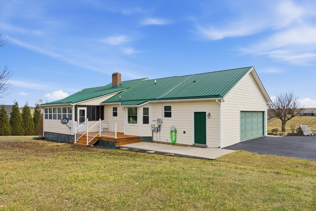 6389 Ruebush Road Dublin, VA 24084 - Photo 58 of 63 a view of a house with pool and chairs