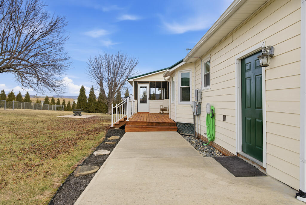 6389 Ruebush Road Dublin, VA 24084 - Photo 59 of 63 a view of a house with backyard and trees
