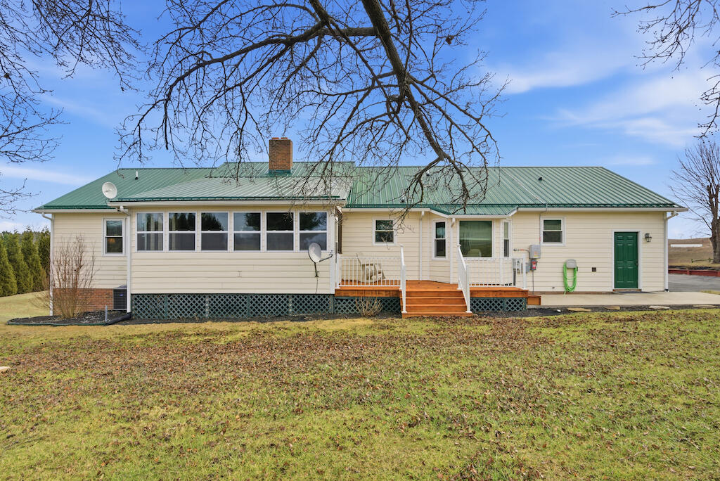 6389 Ruebush Road Dublin, VA 24084 - Photo 61 of 63 front view of house with a yard