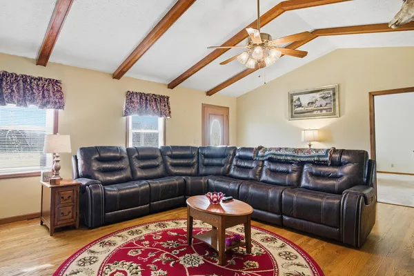 a living room with furniture and a couch