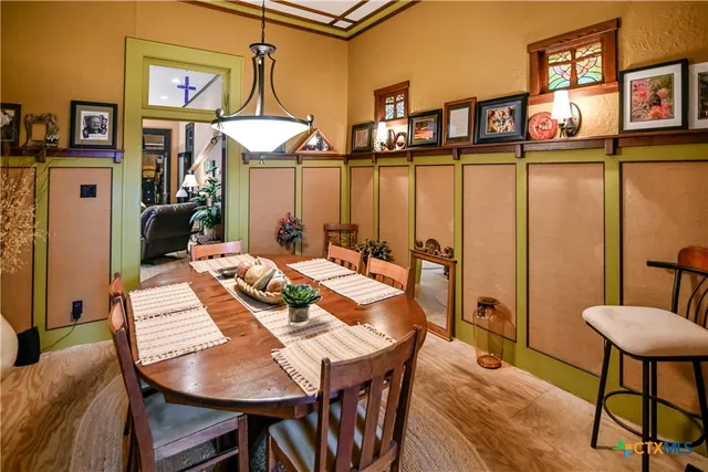 a view of a dining room with furniture