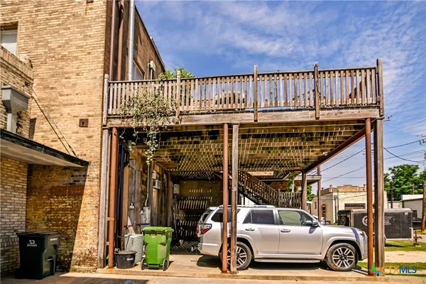 a view of a street with cars