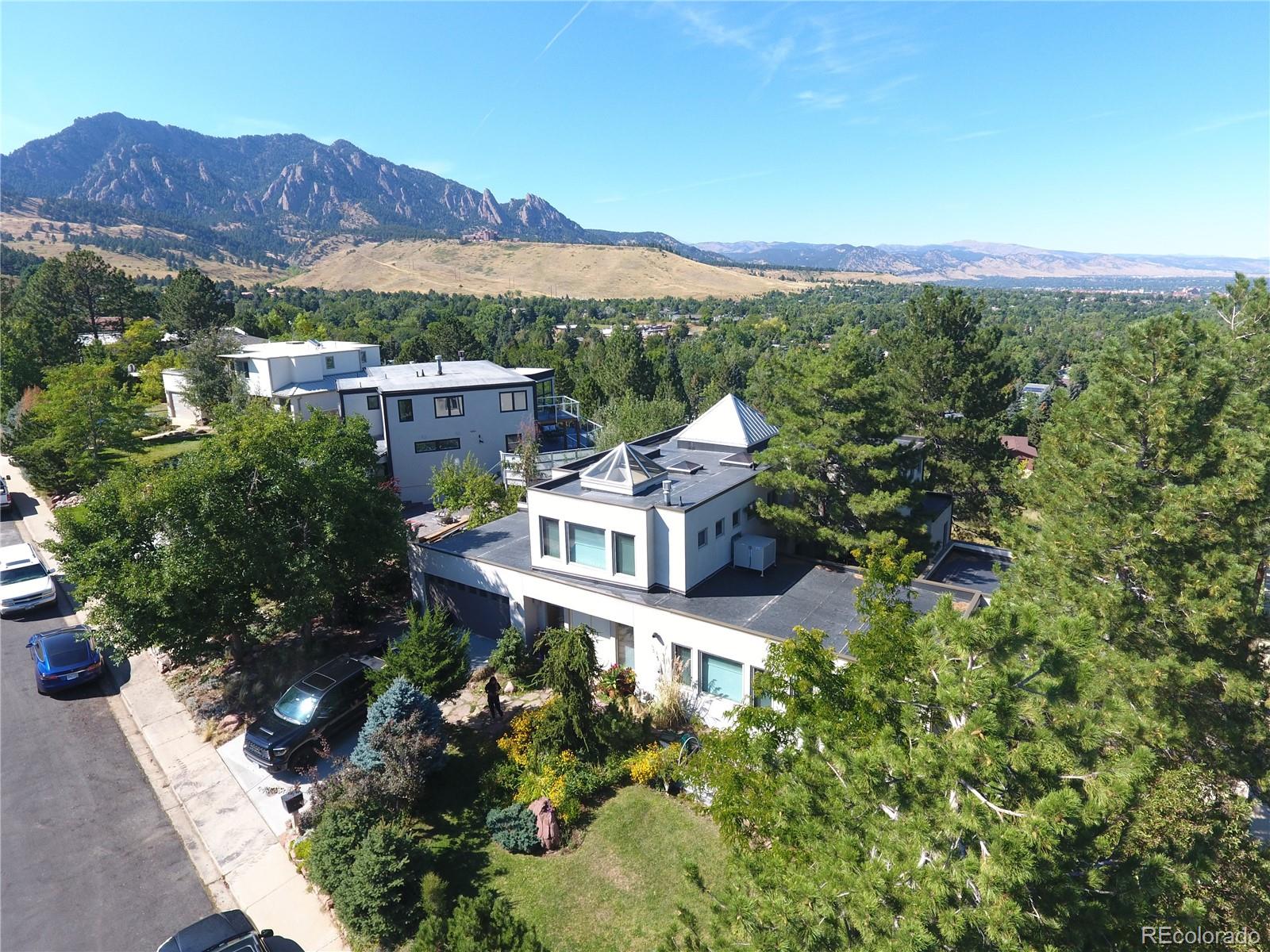 an aerial view of a house with a garden