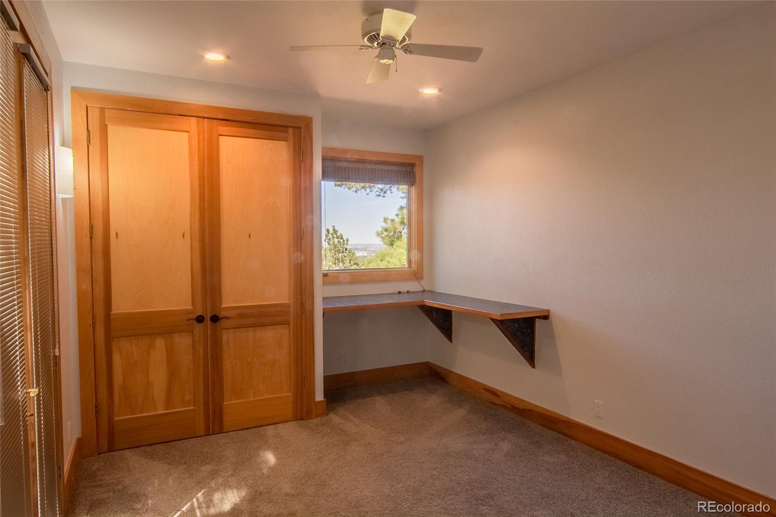 2895 Lafayette Drive Boulder, CO 80305 - Photo 11 of 12 an empty room with windows