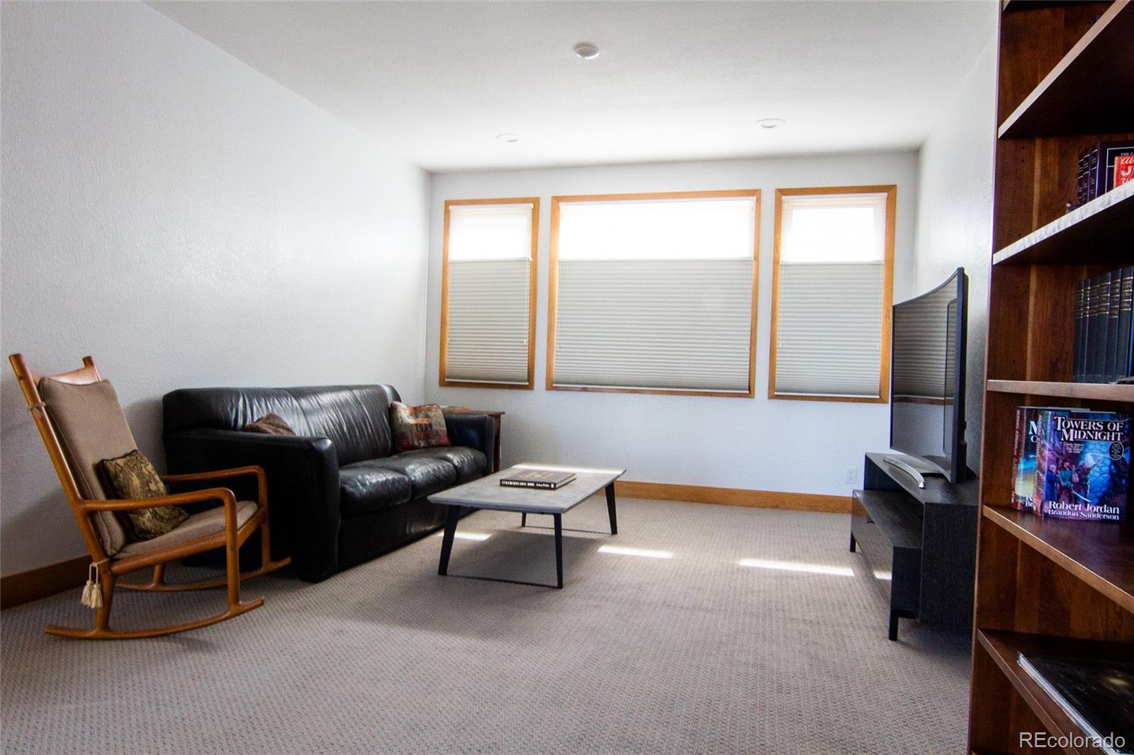 2895 Lafayette Drive Boulder, CO 80305 - Photo 5 of 12 a living room with furniture and a flat screen tv