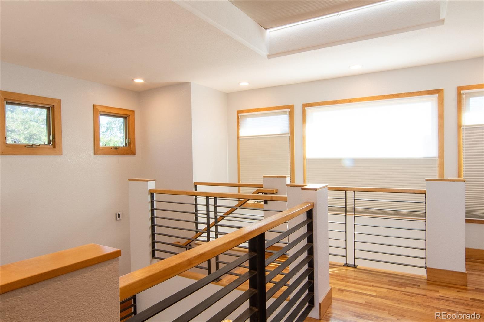 2895 Lafayette Drive Boulder, CO 80305 - Photo 10 of 12 a view of a room with wooden floor and windows