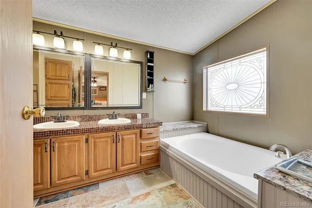 a view of balcony with furniture