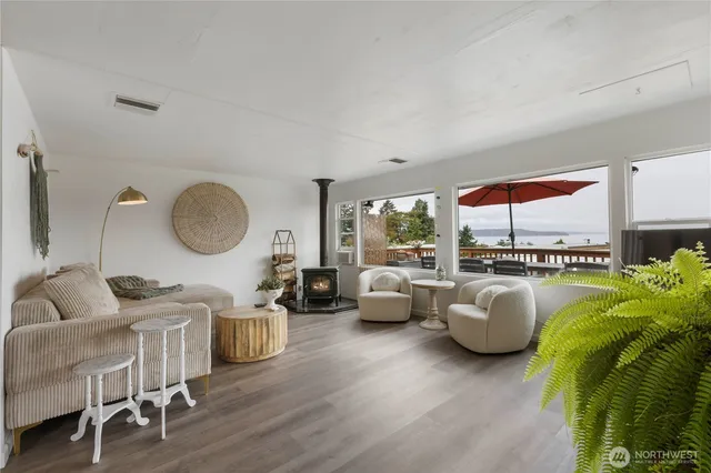 a kitchen that has a sink and a stove in it