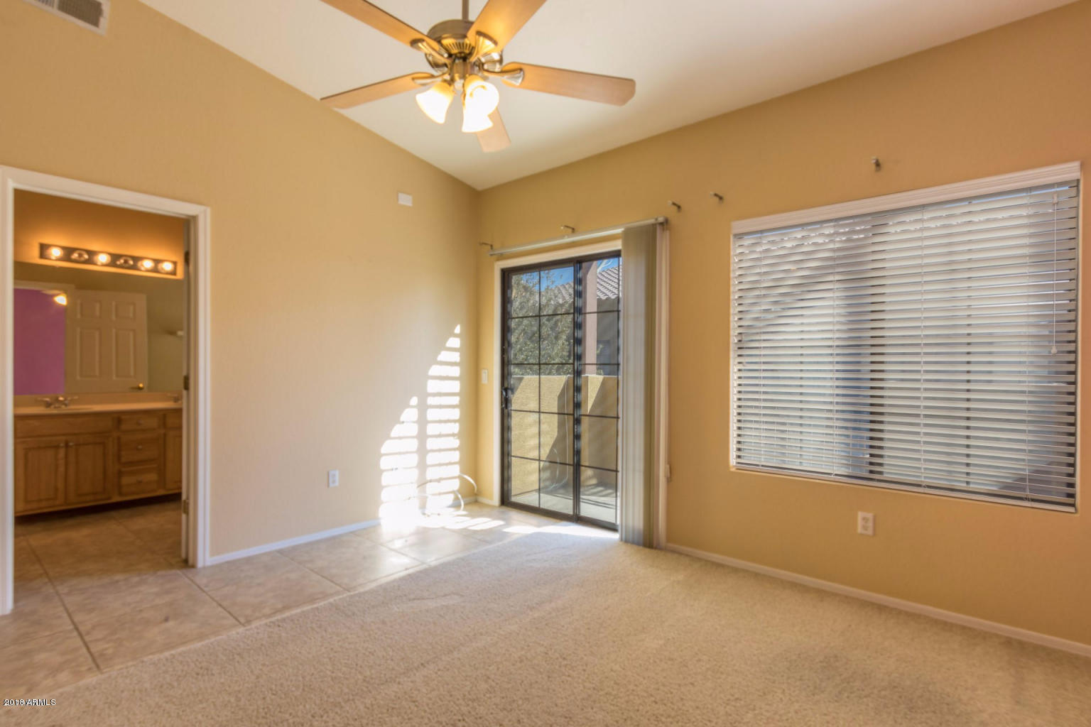 1702 East Bell Road, Unit 147 Phoenix, AZ 85022 - Photo 8 of 24 Master bedroom with balcony