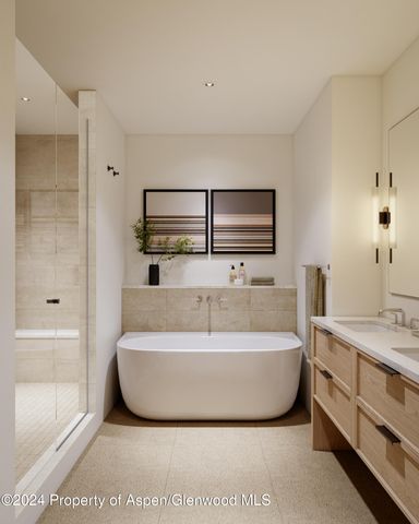 a spacious bathroom with a bathtub and shower