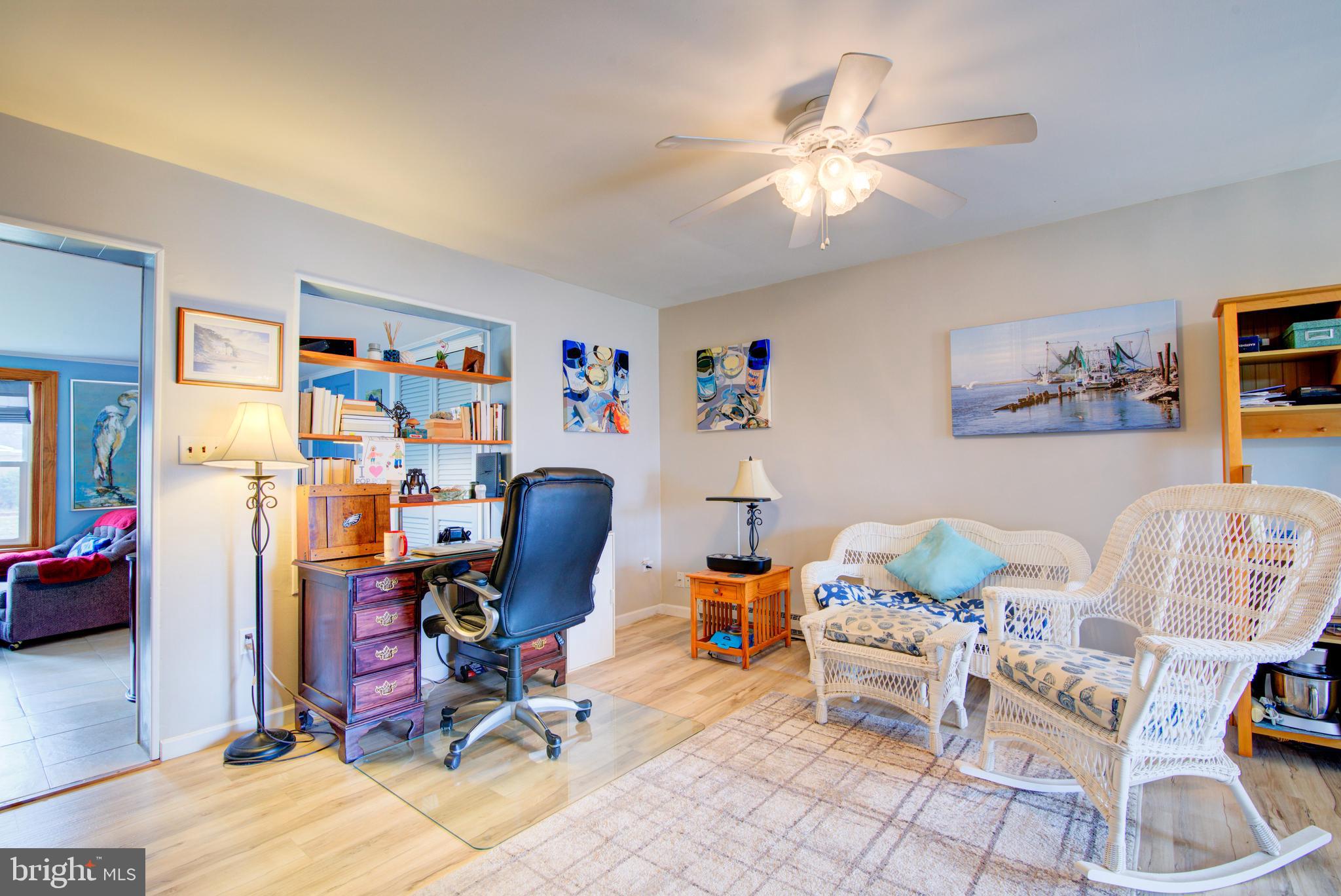 62 Darl Circle Colonial Beach, VA 22443 - Photo 19 of 47 a view of a workspace with furniture and a livingroom