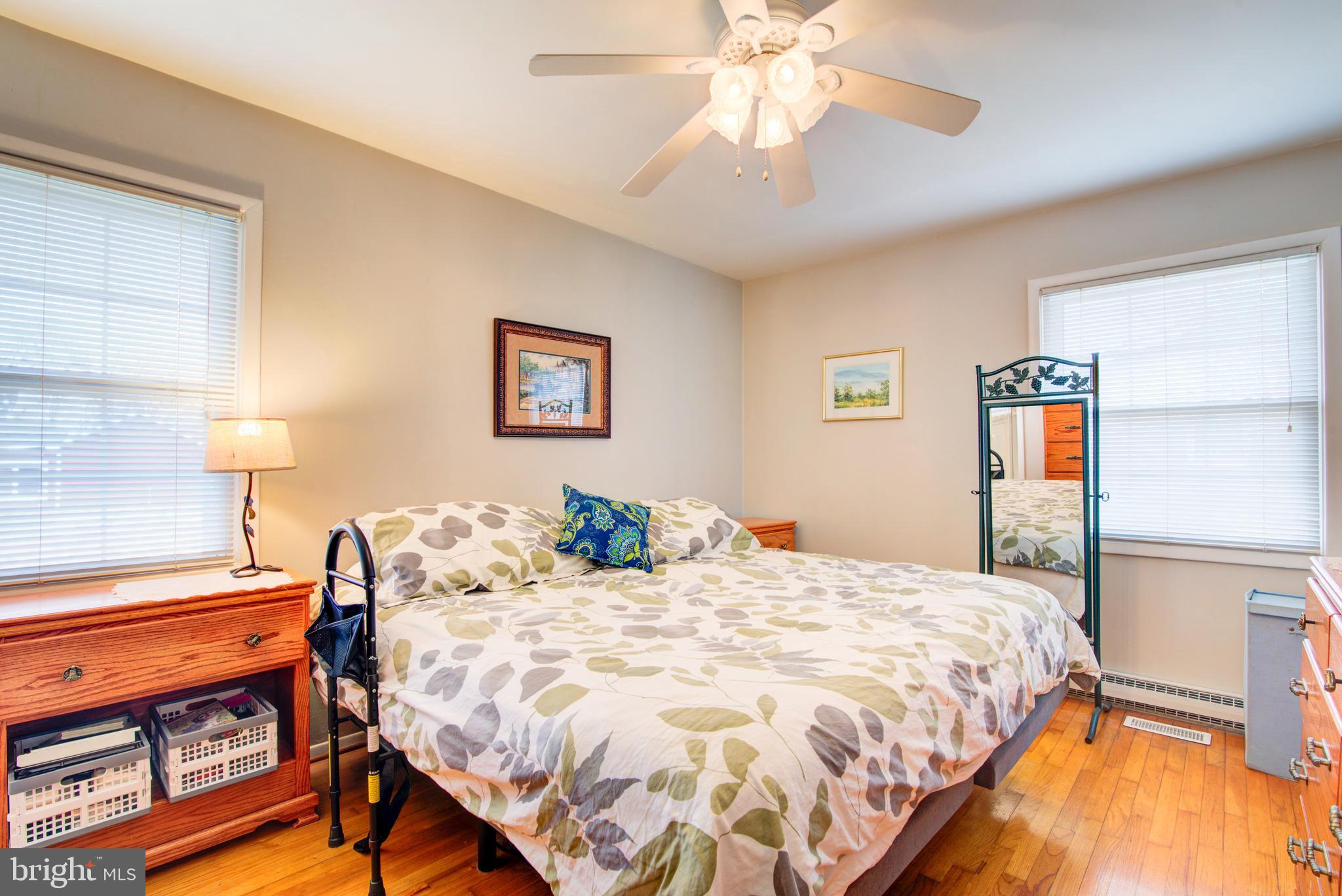 62 Darl Circle Colonial Beach, VA 22443 - Photo 28 of 47 a bedroom with a bed and a chandelier
