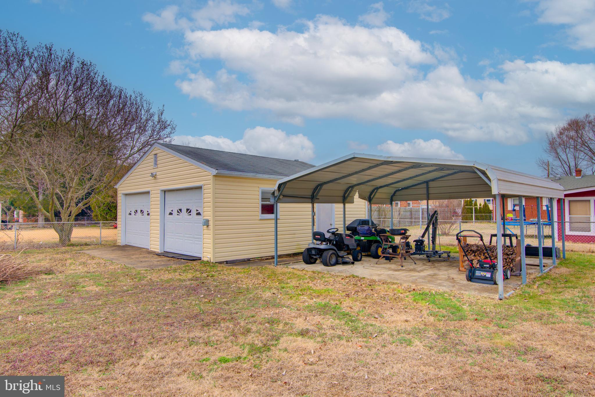 62 Darl Circle Colonial Beach, VA 22443 - Photo 29 of 47 a view of a house with backyard and sitting area