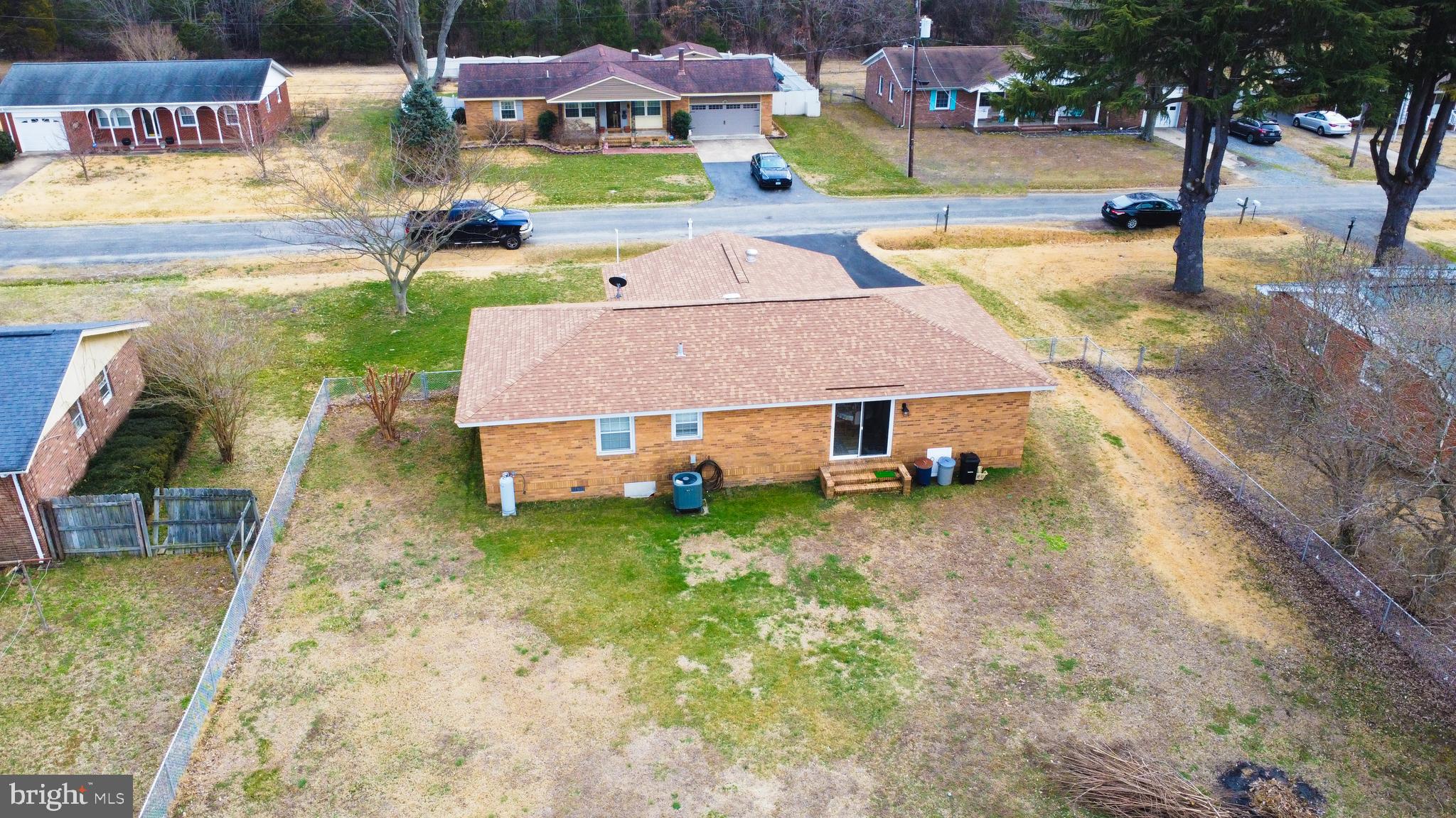 62 Darl Circle Colonial Beach, VA 22443 - Photo 30 of 47 an aerial view of a house with swimming pool