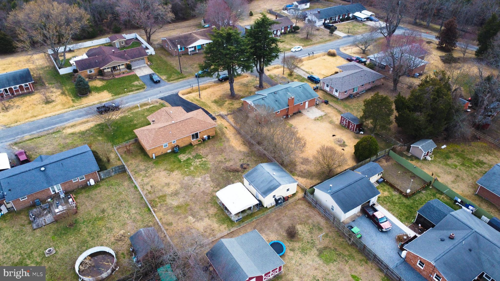 62 Darl Circle Colonial Beach, VA 22443 - Photo 33 of 47 an aerial view of residential house with outdoor space and swimming pool