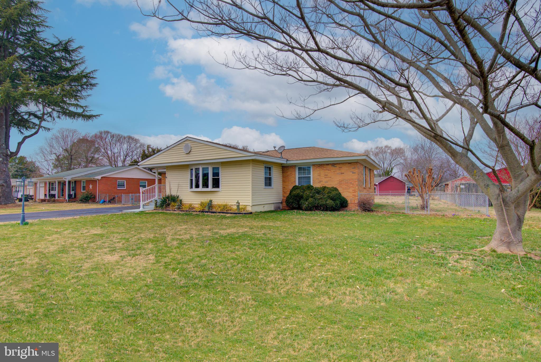 62 Darl Circle Colonial Beach, VA 22443 - Photo 6 of 47 a front view of house with yard and seating area