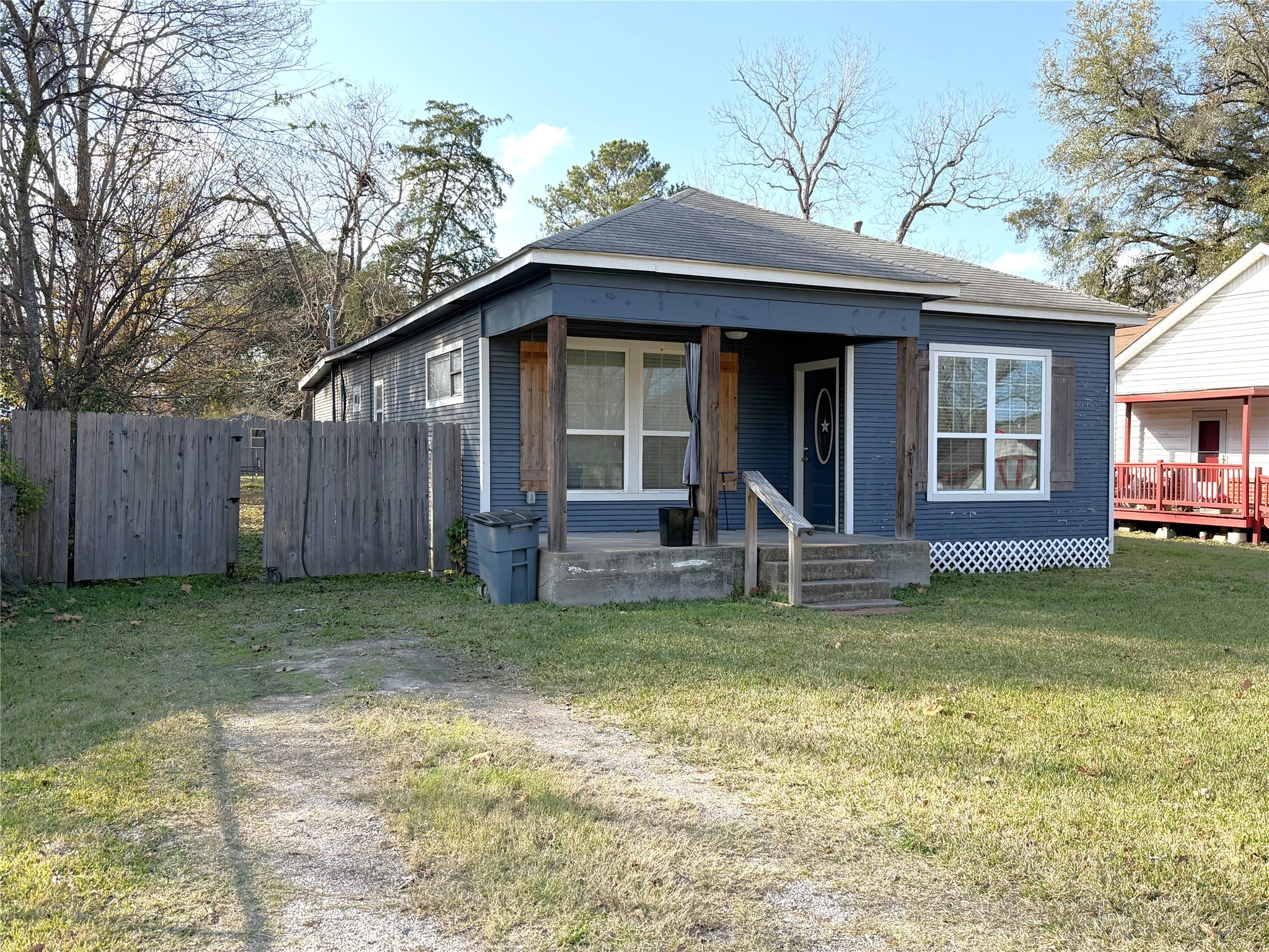 410 North Elm Street Trinity, TX 75862 - Photo 2 of 20 a view of a house with a yard