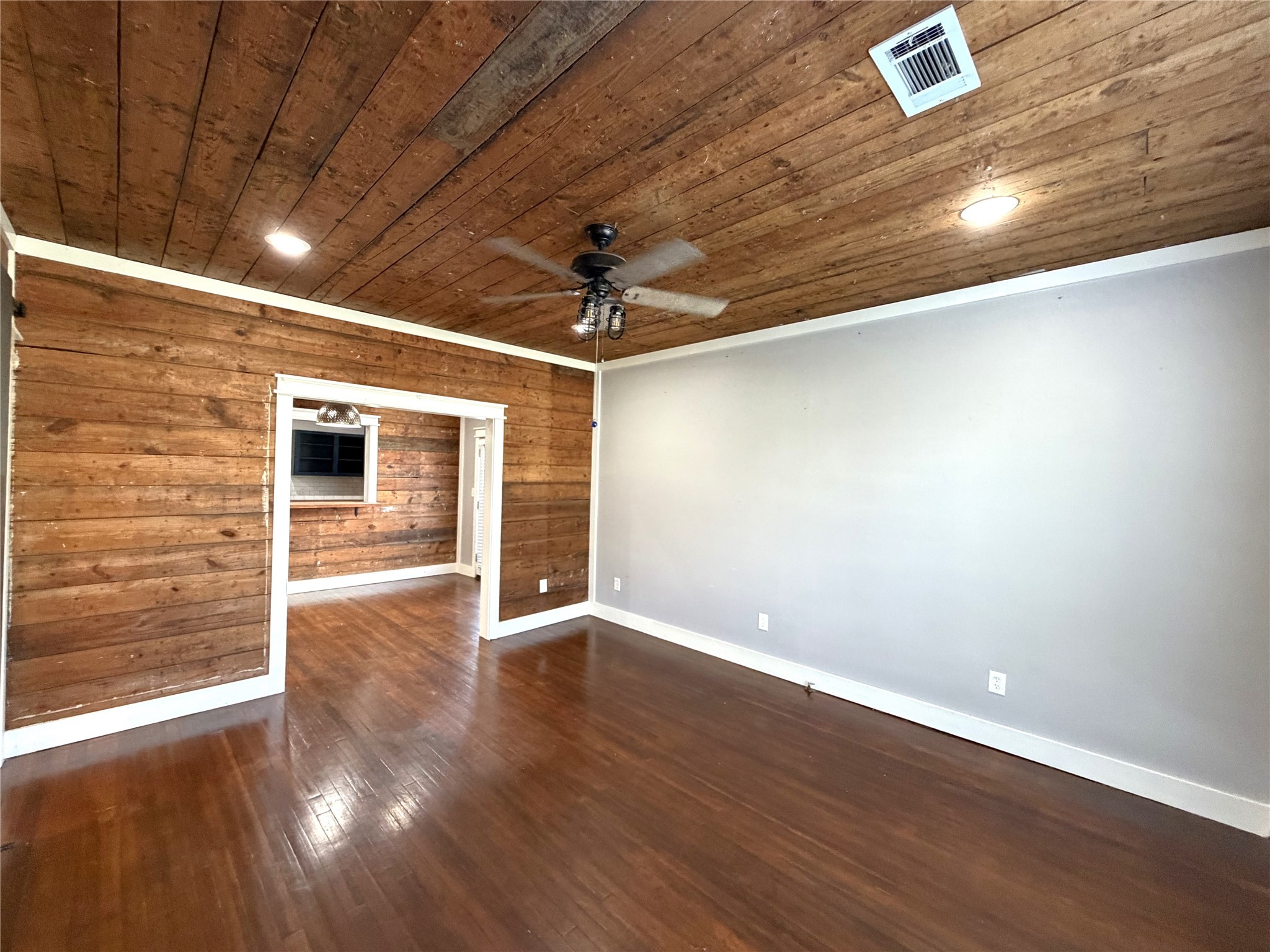410 North Elm Street Trinity, TX 75862 - Photo 7 of 20 a view of a livingroom with wooden floor