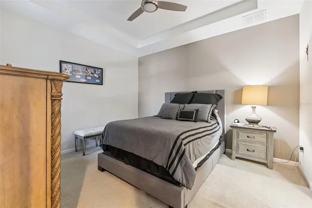 a bathroom with a sink a light fixture and a mirror