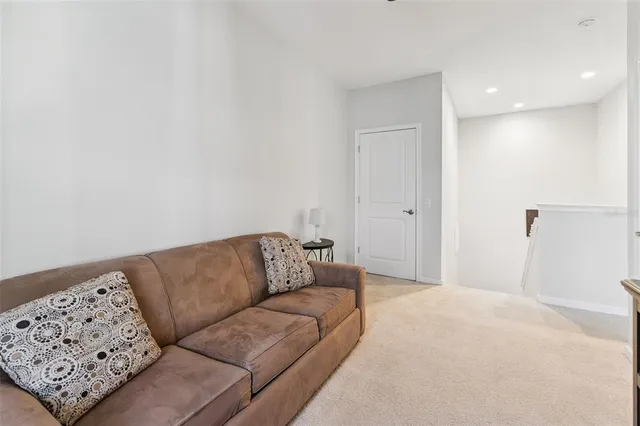 a bedroom with furniture and windows