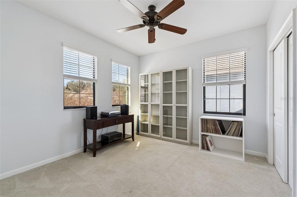 5714 Colony Glen Road Lithia, FL 33547 - Photo 21 of 66 a living room with furniture and a window