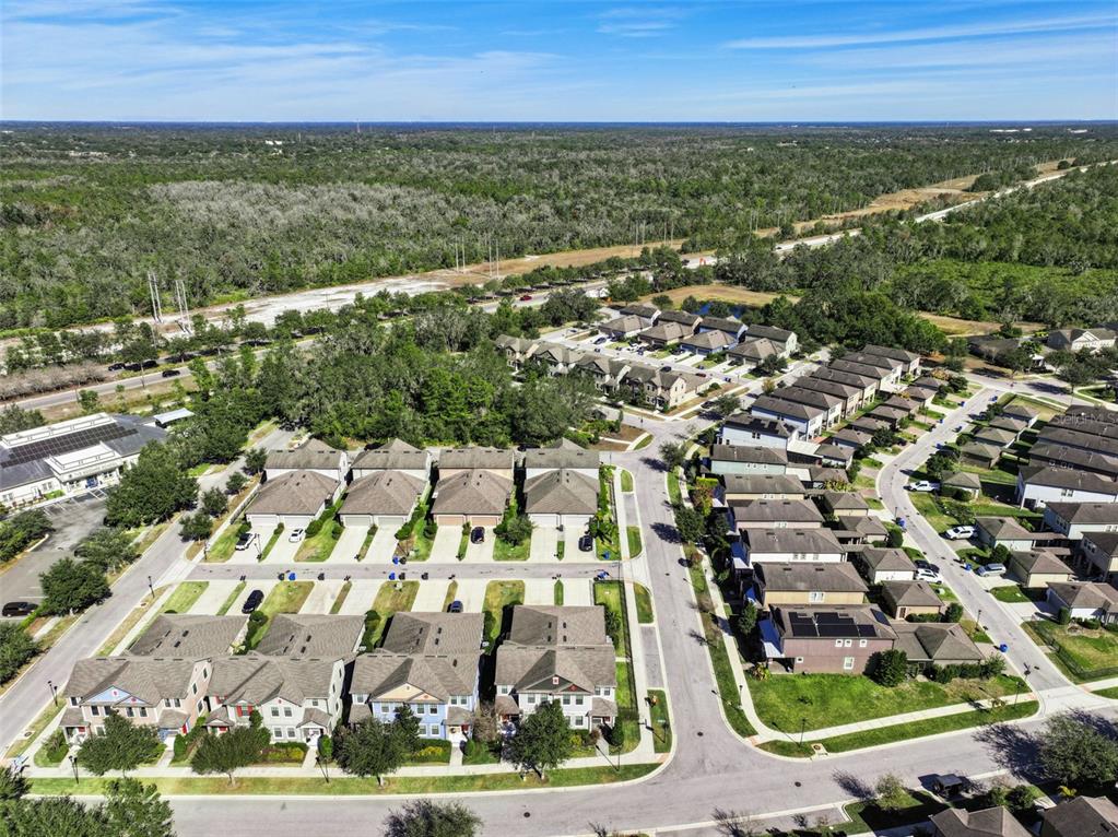 5714 Colony Glen Road Lithia, FL 33547 - Photo 35 of 66 an aerial view of residential houses with outdoor space