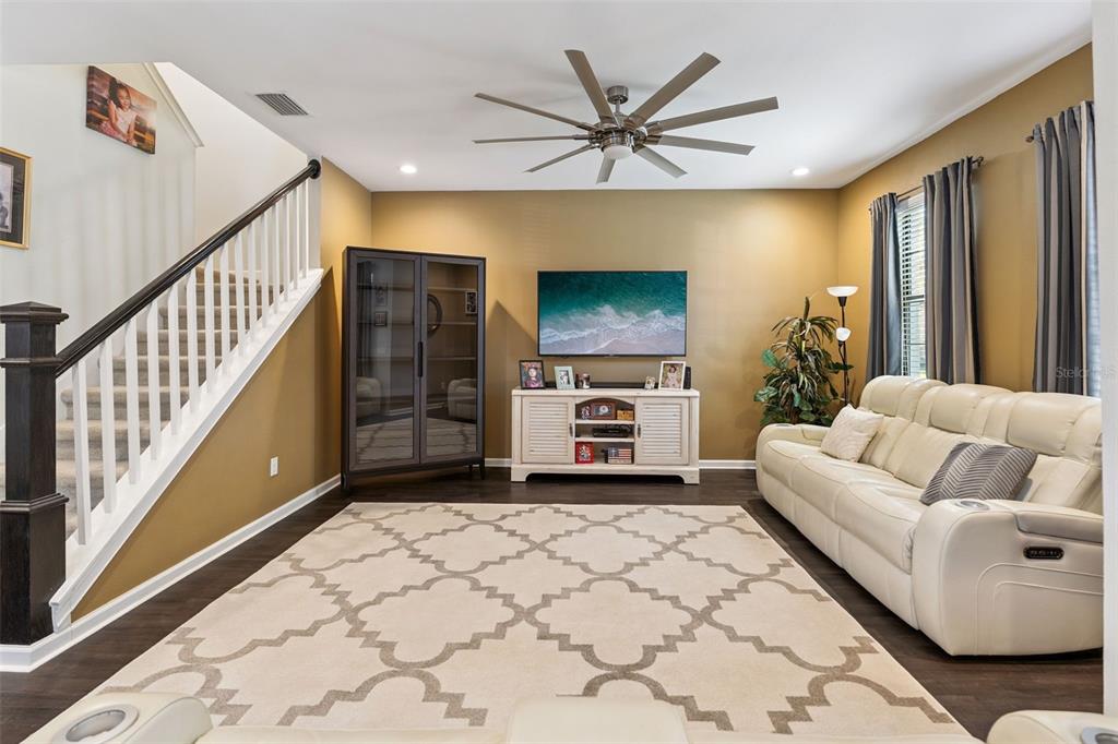 5714 Colony Glen Road Lithia, FL 33547 - Photo 5 of 66 a living room with furniture and a flat screen tv