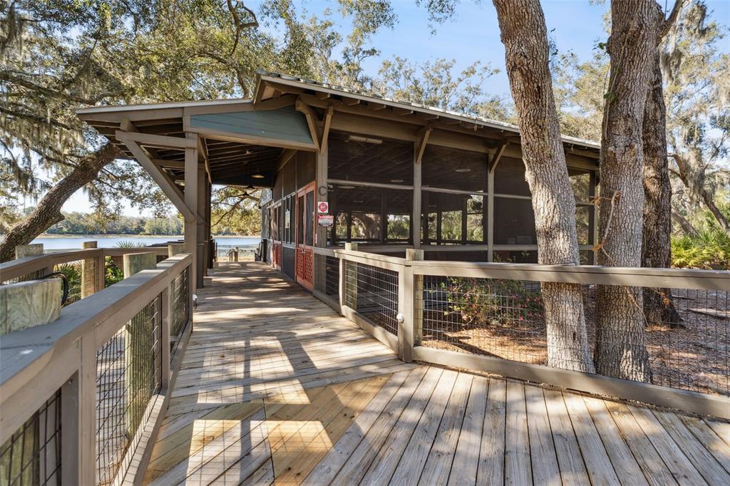 5714 Colony Glen Road Lithia, FL 33547 - Photo 57 of 66 a view of a balcony with wooden floor and fence