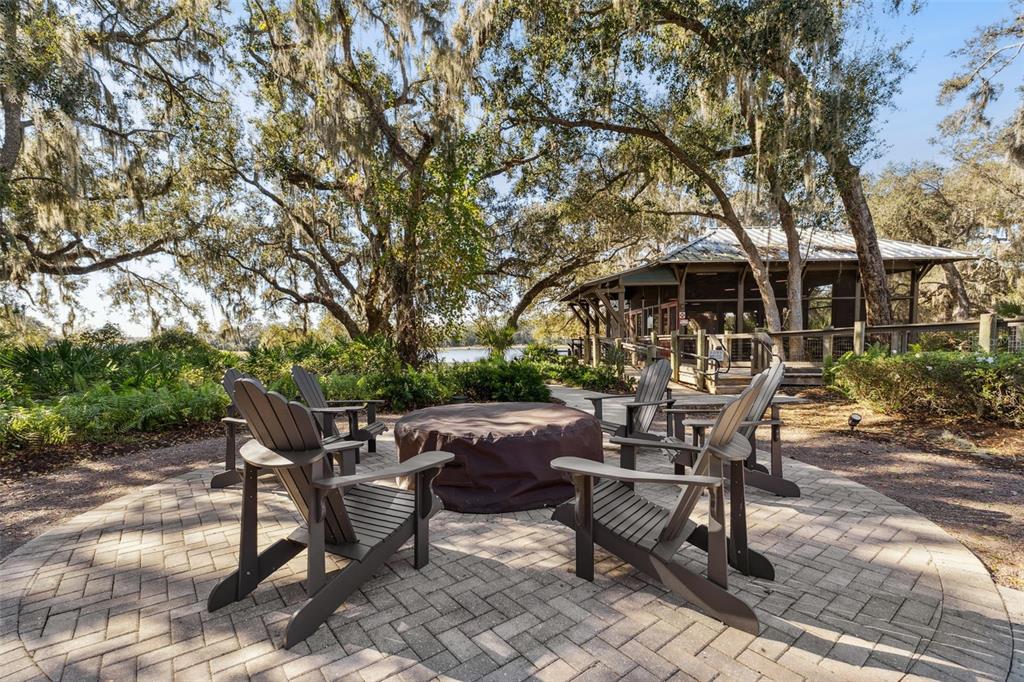 5714 Colony Glen Road Lithia, FL 33547 - Photo 58 of 66 a view of a bench and chairs in the patio