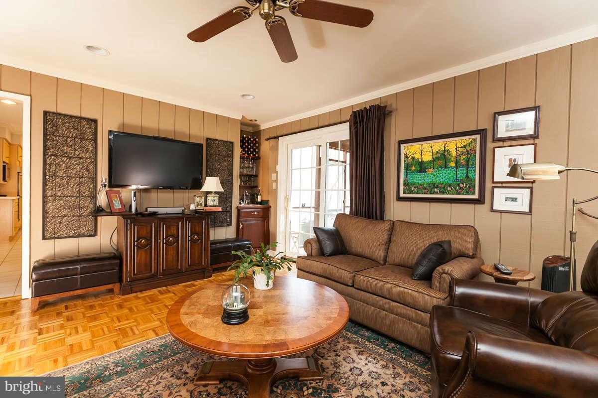2007 Pine Pep Road Reisterstown, MD 21136 - Photo 11 of 30 a living room with furniture and a flat screen tv