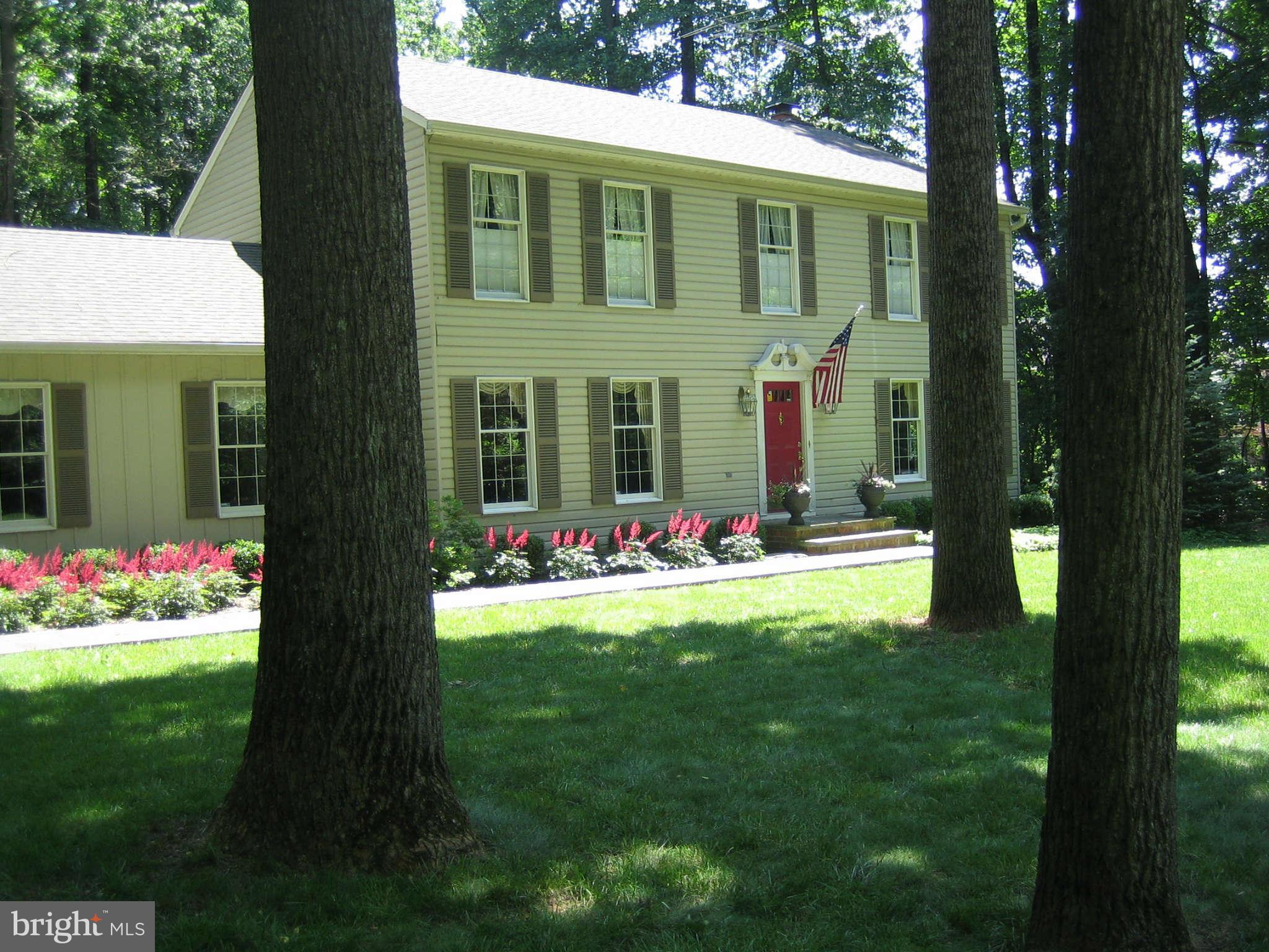2007 Pine Pep Road Reisterstown, MD 21136 - Photo 4 of 30 a front view of a house with a yard