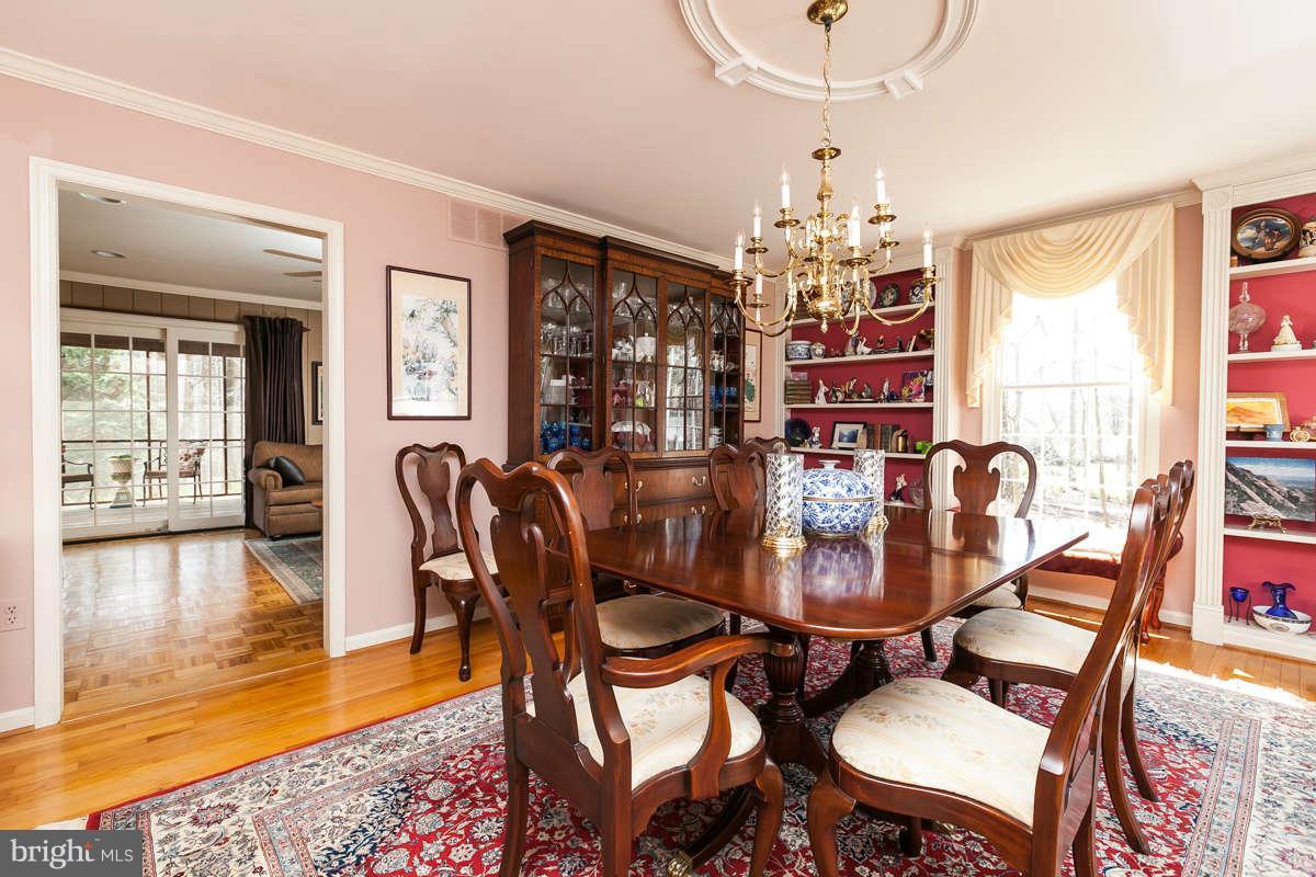 2007 Pine Pep Road Reisterstown, MD 21136 - Photo 9 of 30 a view of a dining room with furniture wooden floor and chandelier